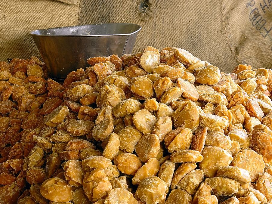 Jaggery pieces on a small wooden board
